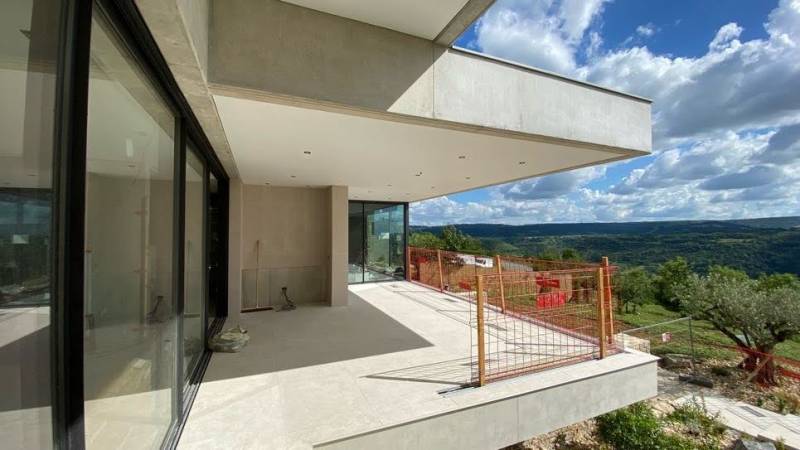 Plafond tendu et chauffage rayonnant sous une terrasse couverte - Rodez - Plafonds Tendus Occitans Venerque