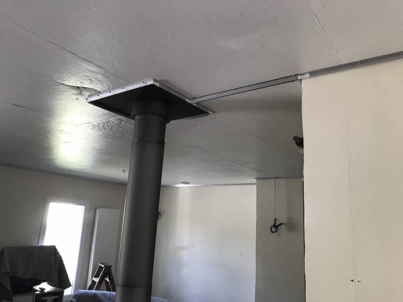 Pose d'un séparateur du mur au poêle - Roques sur garonne 